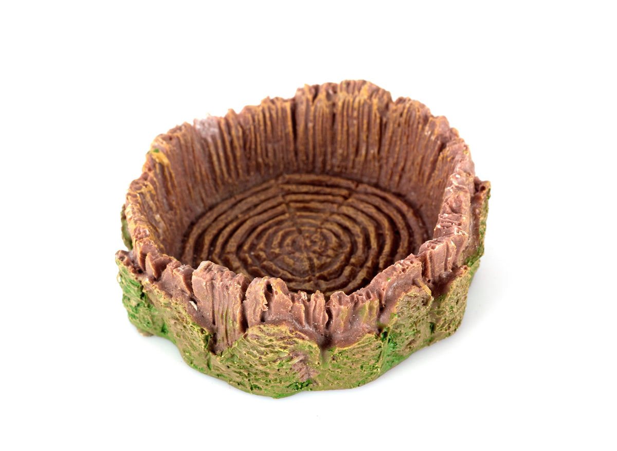 A shallow reptile dish with a bark-textured exterior on a white background.