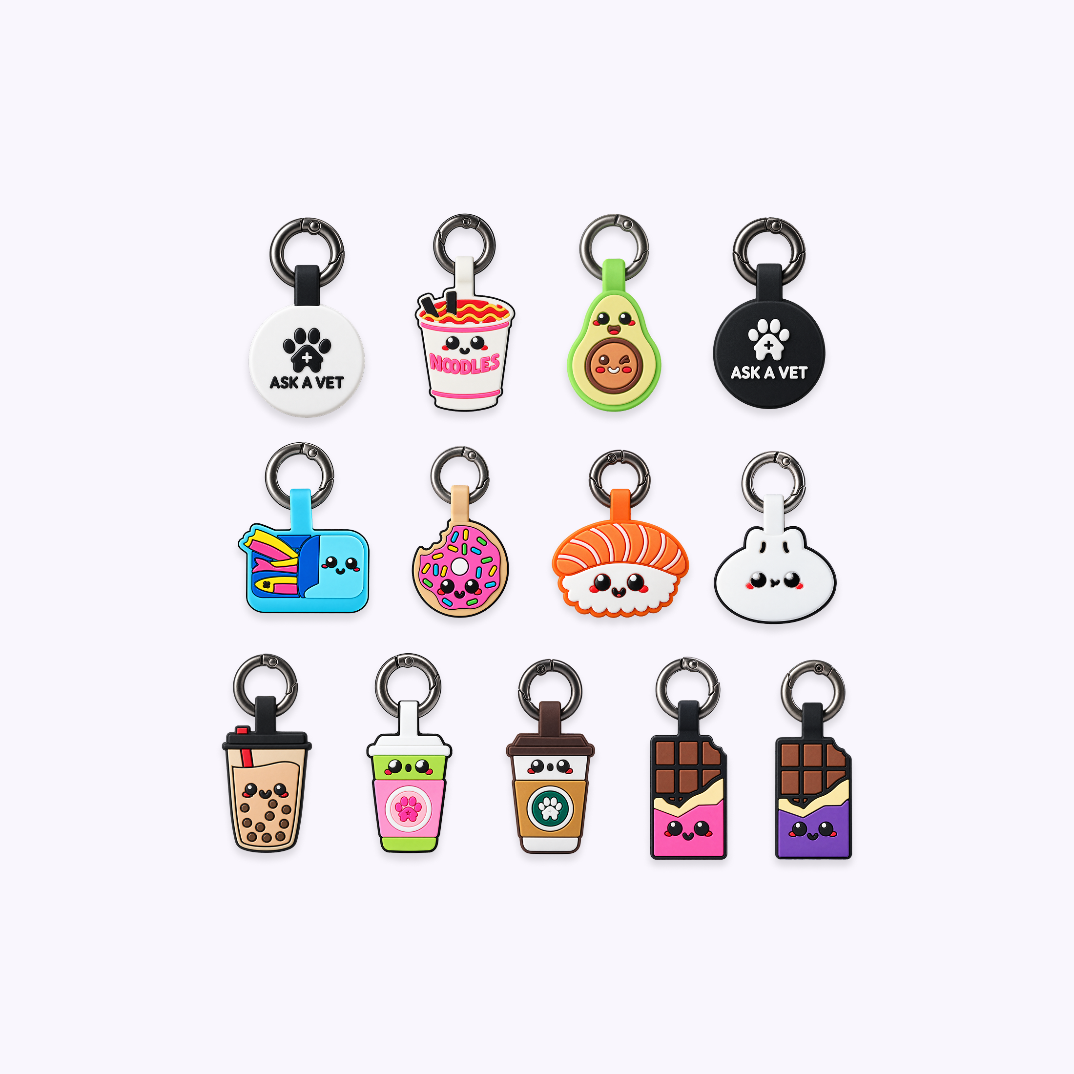 Collection of 13 Ask A Vet smart pet ID tags with metal rings, featuring round logo tags and colourful food, drink and bunny designs.